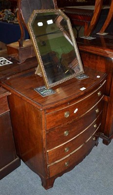 Lot 537 - Bow front chest of drawers and mirror