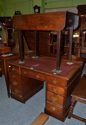 Lot 540 - A late Victorian walnut small pedestal desk and an oak Pembroke table