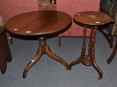 Lot 552 - A Victorian walnut occasional table and a Georgian oak tripod table (2)