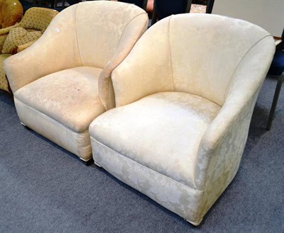 Lot 566 - Pair of cream brocade upholstered tub chairs