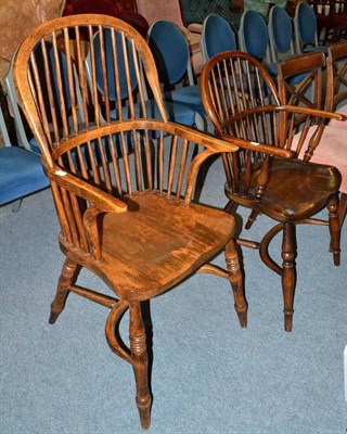 Lot 569 - Two Paul Kent Windsor style armchairs