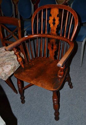 Lot 571 - A 19th century ash and elm Windsor chair with crinoline stretcher