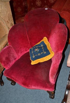 Lot 574 - Victorian walnut shell back armchair upholstered in crimson velvet