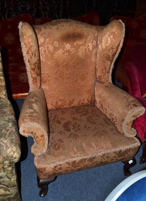 Lot 575 - Mahogany wing armchair