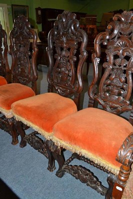 Lot 579 - Set of six Continental carved oak dining chairs