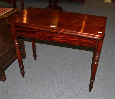 Lot 580 - 19th century fold over swivel top tea table