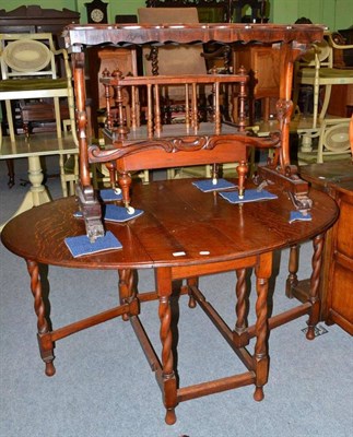 Lot 585 - A Victorian rosewood window table (a.f.) and an oak gateleg table