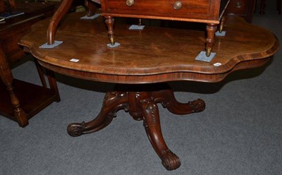 Lot 594 - A Victorian rosewood breakfast table with a well carved pedestal base