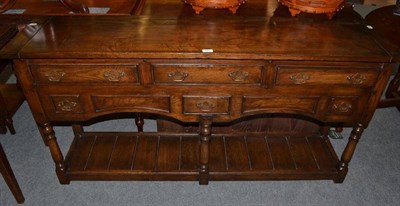 Lot 597 - Oak sideboard in 18th century style