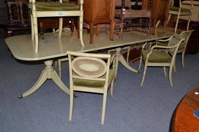 Lot 601 - Regency style painted dining room suite with triple pedestal table, two extra leaves, and eight...