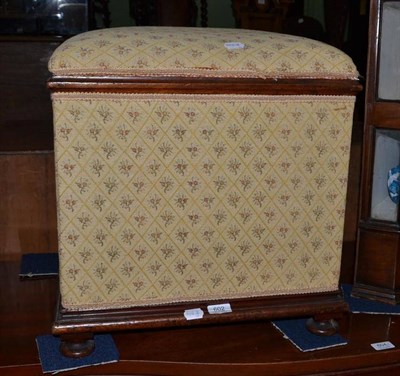 Lot 602 - A Victorian mahogany framed ottoman stool upholstered in yellow diapered weave