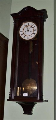 Lot 625 - A double weight driven Vienna type wall clock