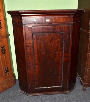 Lot 627 - 19th century mahogany corner cupboard