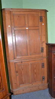 Lot 628 - Pine corner cupboard