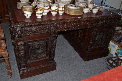 Lot 635 - Victorian carved oak partner's desk