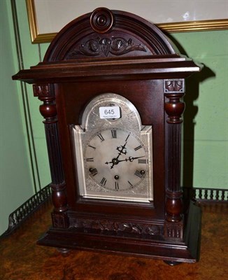 Lot 645 - A mahogany mantel clock