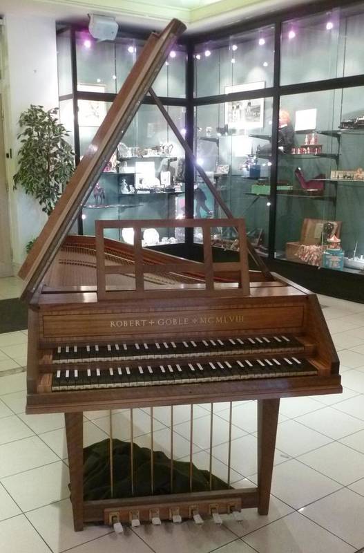 Lot 655 - A walnut cased Harpsichord by Robert Goble 1958, with ebony keys, seven pedals, dust cover,...