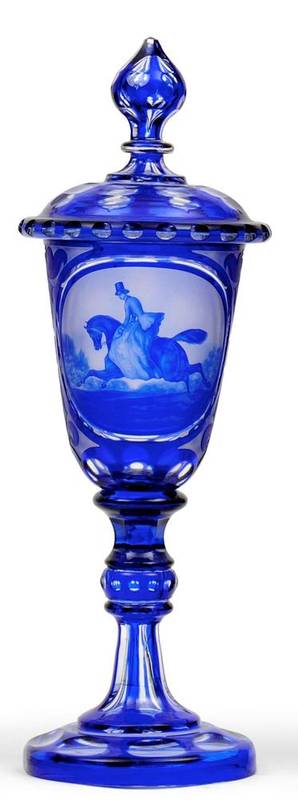 Lot 36 - A Bohemian Blue Overlay Clear Glass Goblet and Cover, mid 19th century, with ovoid knop, the...
