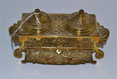 Lot 10 - A Victorian brass two provision ink stand