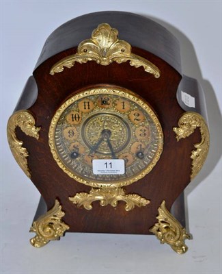 Lot 11 - A Louis XV style mantel clock