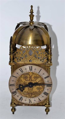 Lot 22 - A lantern style mantel clock