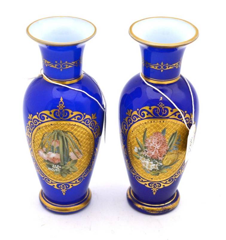 Lot 39 - A Pair of Baccarat Blue Overlay White Glass Vases, 19th century, of baluster form with trumpet...