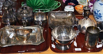 Lot 48 - A four piece plated tea set and a quantity of electro-plate (on two trays)