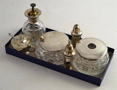 Lot 79 - Silver three piece cruet, two silver topped jars and a sterling atomiser