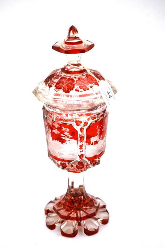Lot 44 - A Bohemian Ruby Flashed Goblet and Cover, mid 19th century, with hexagonal knop, the bowl...