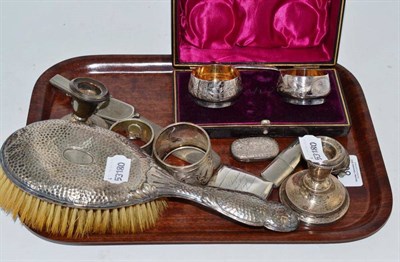 Lot 80 - Pair of dwarf silver candlesticks, silver napkin rings, vesta, campaign knife and fork, cased...