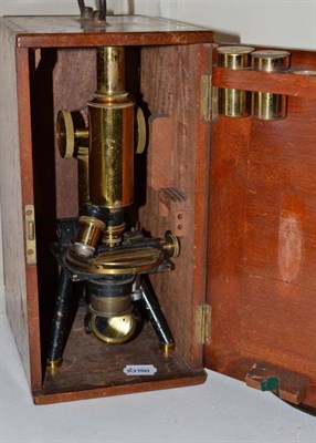 Lot 98 - A cased microscope