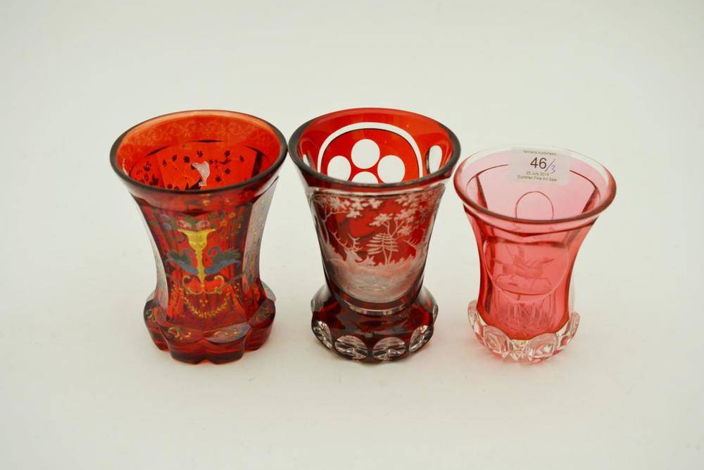 Lot 46 - A Bohemian Cranberry Glass Beaker, late 19th century, of panelled waisted cylindrical form,...