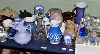 Lot 105 - Shelf including 19th century pottery, relief moulded jug, blue and white tea wares, decanter...