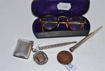 Lot 123 - Silver vesta, silver fob, Stockton token, glasses, Sterling pencil and another plated pencil