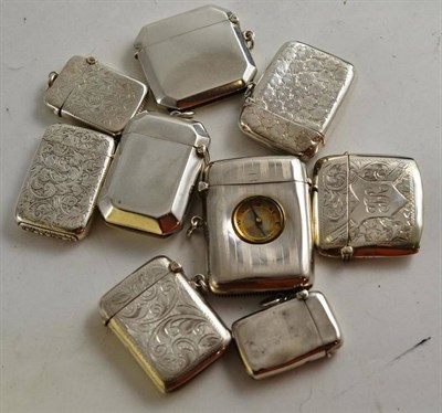 Lot 129 - Nine silver vesta cases one with inset compass