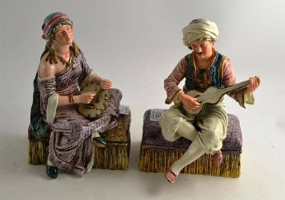 Lot 136 - A pair of Royal Dux figures of Eastern musicians