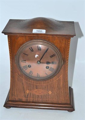 Lot 160 - Inlaid oak dome top mantel clock