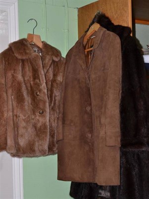 Lot 185 - Dark musquash fur coat, cropped musquash jacket with jewelled buttons, stole and brown suede...