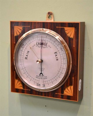 Lot 193 - An inlaid rosewood aneroid barometer