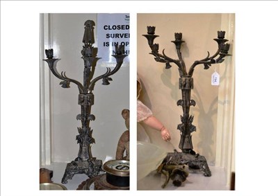 Lot 194 - A pair of plated Egyptian style six branch candelabra (a.f.) and original invoice