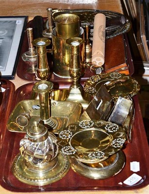 Lot 210 - Two trays of brassware including candlesticks, chestnut roaster, drawing instruments, truncheon etc