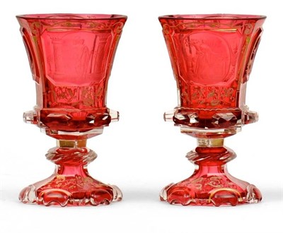 Lot 60 - A Pair of Bohemian Cranberry Flashed Clear Glass Goblets, dated 1842, of panelled campana form,...