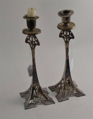 Lot 255 - A pair of WMF candlesticks