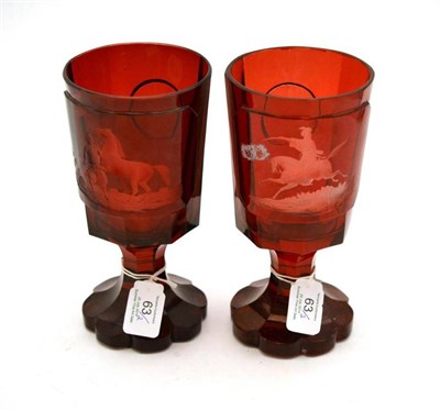 Lot 63 - A Pair of Bohemian Ruby Flashed Goblets, mid 19th century, of panelled form, engraved with...