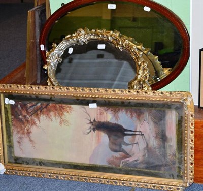 Lot 294 - A gilt framed oil of a stag, a modern gilt framed mirror and an Edwardian oval mirror