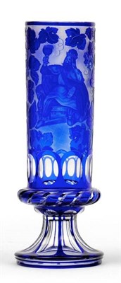 Lot 67 - A Bohemian Blue Overlay Clear Glass Goblet, mid 19th century, of cylindrical form, engraved...