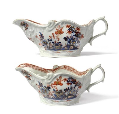 Lot 70 - A Pair of Chaffers Liverpool Porcelain Sauceboats, circa 1760, of lobed oval form moulded with...