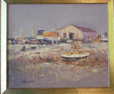 Lot 393 - William Norman Gaunt FIAL, NDD (1918-2001) Sunlit boatyard Signed, oil on canvas, 50cm by 60cm