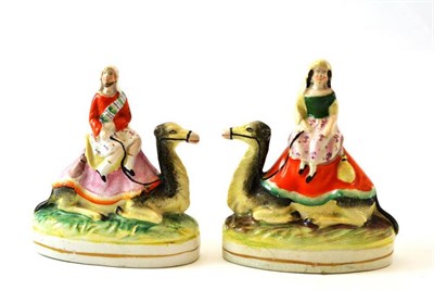 Lot 76 - A Pair of Staffordshire Pottery Figures of Sir Richard and Lady Burton, 19th century, each...
