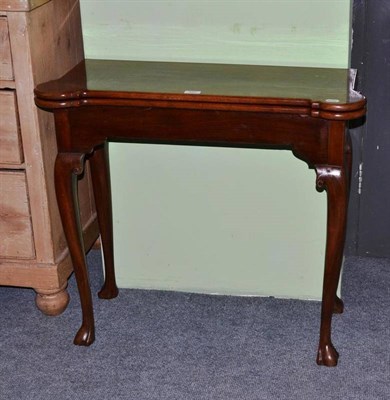 Lot 452 - Mahogany fold over tea table with rounded corners